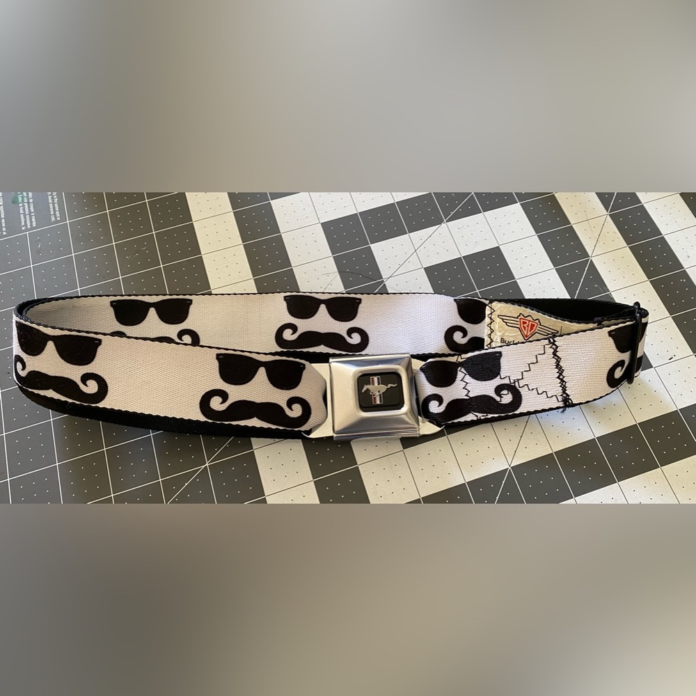 Vintage 90s mustache Buckle-Down's design